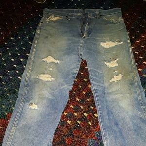 distressed Wranglers in Men